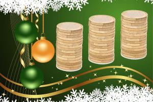 Piles of coins on a Christmas background